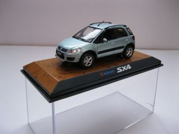 Diecast model cars Suzuki SX4 1/43 Norev orange 2006