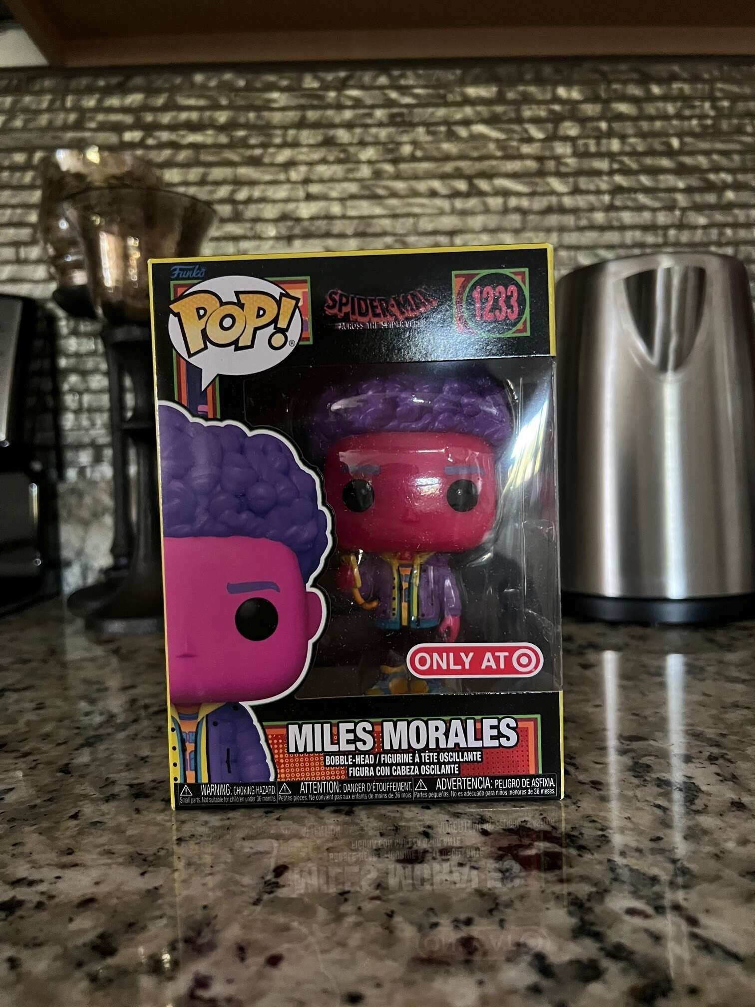 Buy Pop! Miles Morales with Cell Phone (Black Light) at Funko.